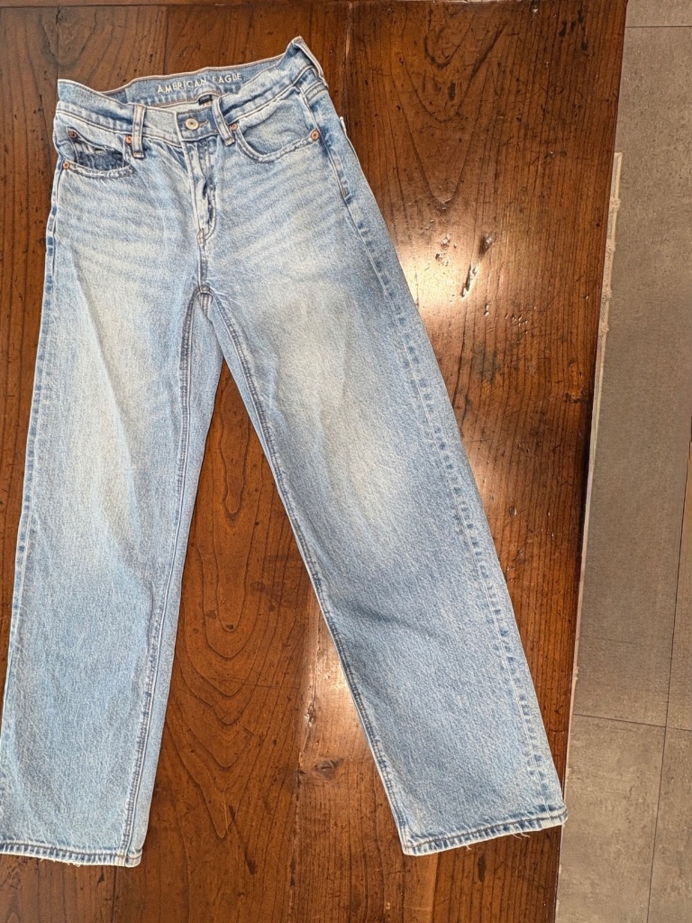 American Eagle Strigid Super High Waisted Straight Leg Jeans Light Wash Size 000